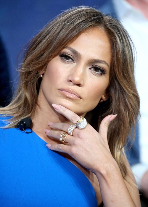 Jennifer Lopez hand on face